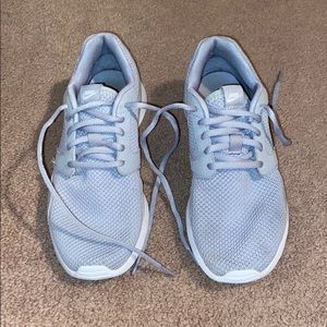 Grey Nike tennis shoes